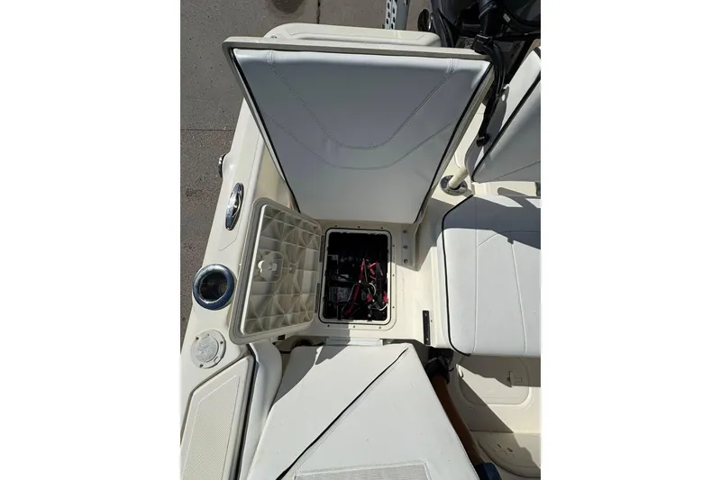 Slide: The Image of 2023 Skeeter SX2550 Family boat interior with open storage compartment. - 12