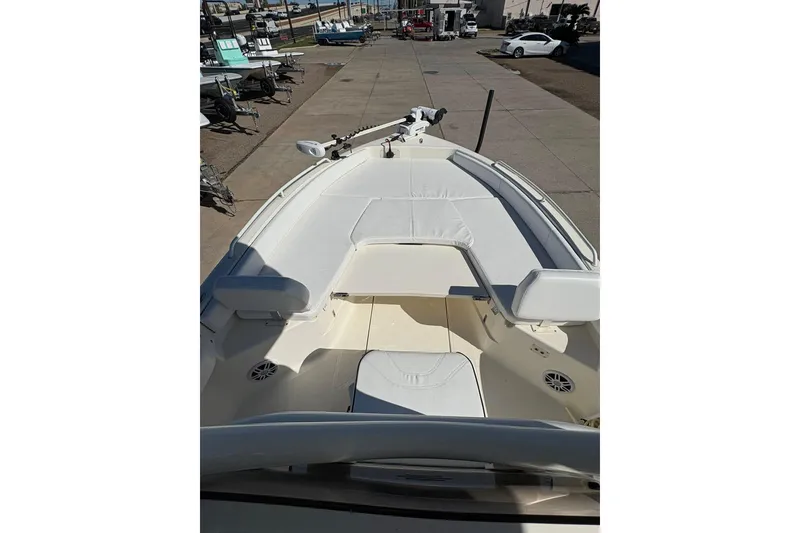 Slide: The Image of 2023 Skeeter SX2550 Family boat interior with white seating and deck. - 15