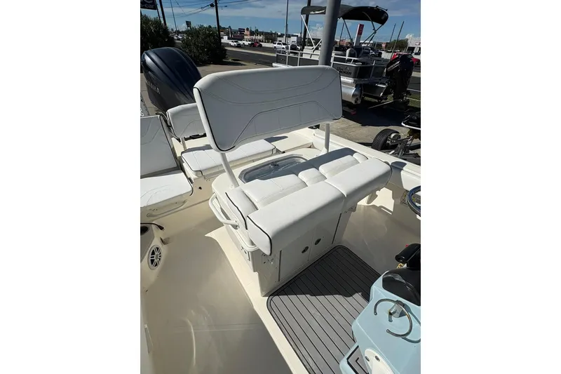Slide: The Image of 2023 Skeeter SX2550 Family boat interior with white seating and modern design. - 16