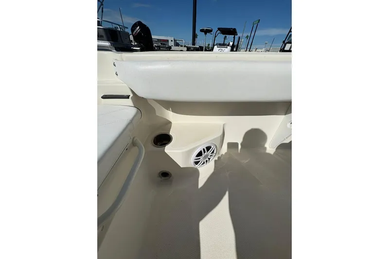 Slide: The Image of 2023 Skeeter SX2550 Family boat interior with speaker and seating area. - 18