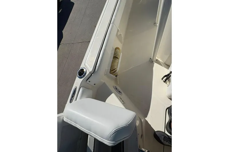 Slide: The Image of 2023 Skeeter SX2550 Family boat interior with white seating and deck details. - 24
