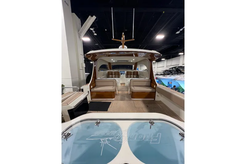Slide: The Image of 2026 Front Runner 43 HTX Catamaran interior with luxurious seating and modern design. - 16