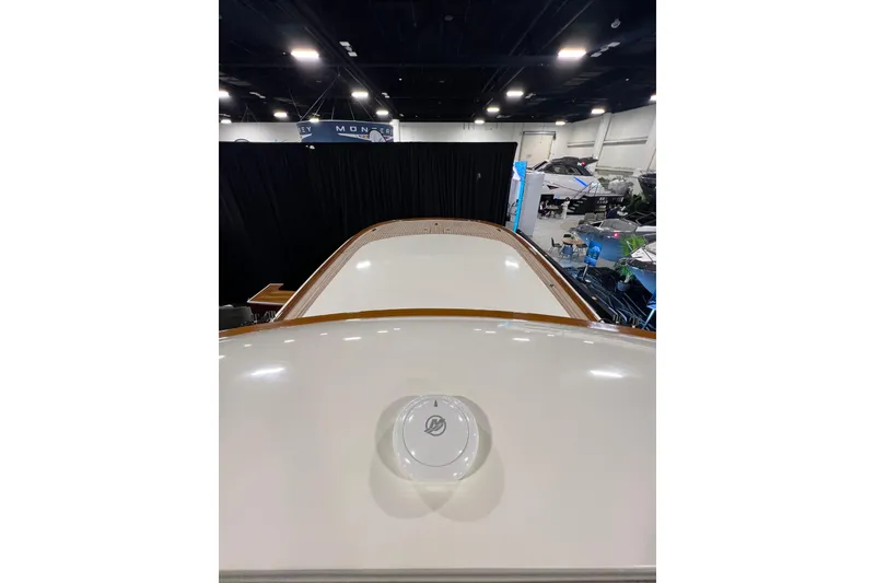 Slide: The Image of 2026 Front Runner 43 HTX Catamaran showcased indoors, top view of sleek deck design. - 6
