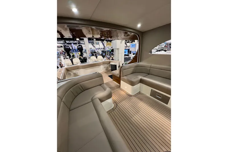 Slide: The Image of Luxurious interior of 2026 Front Runner 43 HTX Catamaran with elegant seating and wood flooring. - 11