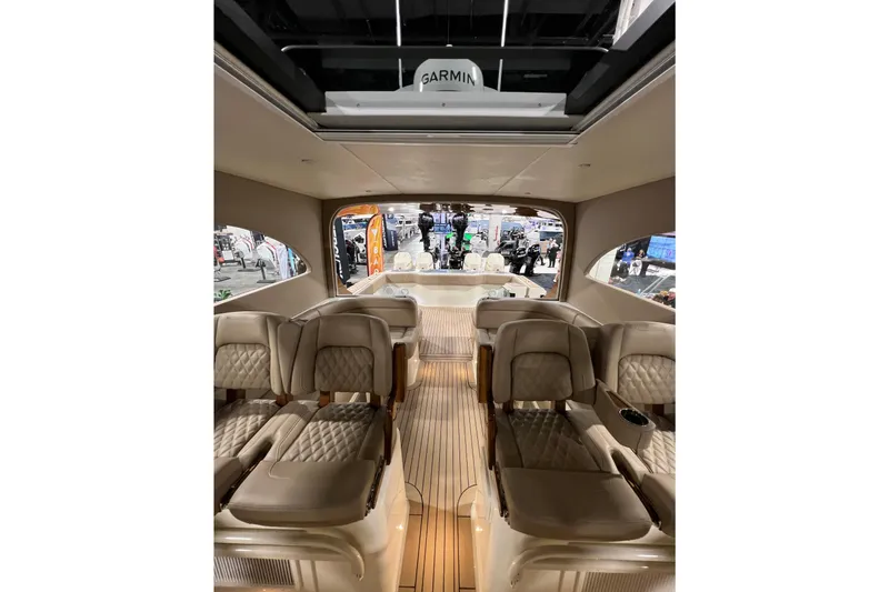 Slide: The Image of Luxurious interior of 2026 Front Runner 43 HTX Catamaran with plush seating and wood flooring. - 5