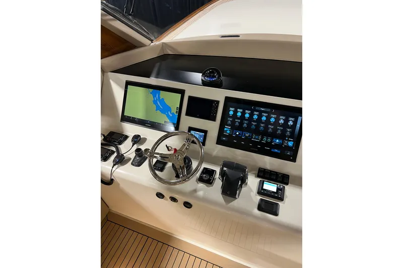 Slide: The Image of Helm of 2026 Front Runner 43 HTX Catamaran with advanced navigation displays. - 7