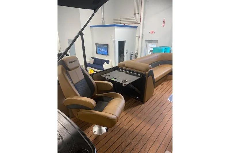 Slide: The Image of 2026 Bentley Pontoons Elite 253 Swingback interior with luxurious seating and modern design. - 15
