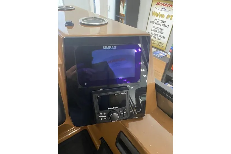 Slide: The Image of 2026 Bentley Pontoons Elite 253 Swingback dashboard with Simrad display and controls. - 6