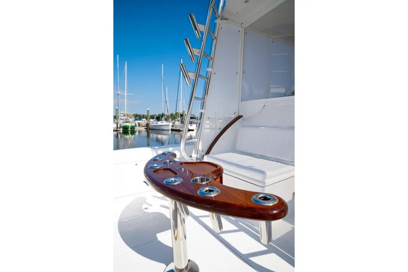 Slide: The Image of Luxury fishing setup on 2026 Front Runner 47 W/A yacht, featuring rod holders and seating. - 3