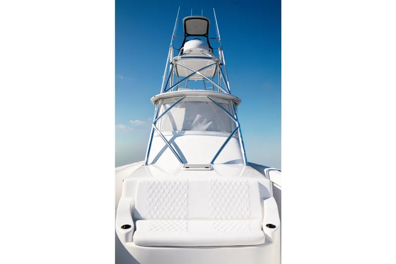 Slide: The Image of 2026 Front Runner 47 W/A boat with tower against clear blue sky. - 14