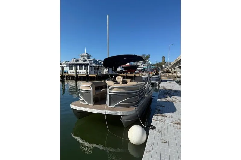 Slide: The Image of 2023 Sun Tracker Party Barge 22 DLX pontoon boat docked at marina. - 54