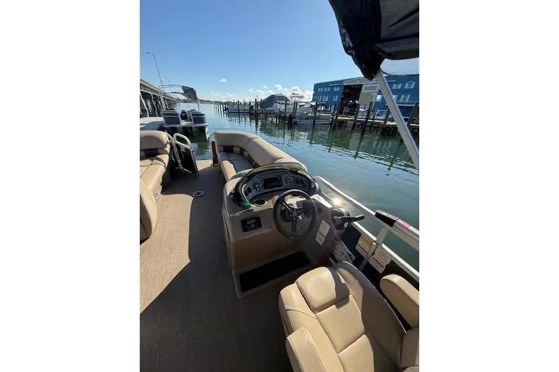 Slide: The Image of 2023 Sun Tracker Party Barge 22 DLX pontoon boat interior at dock. - 55