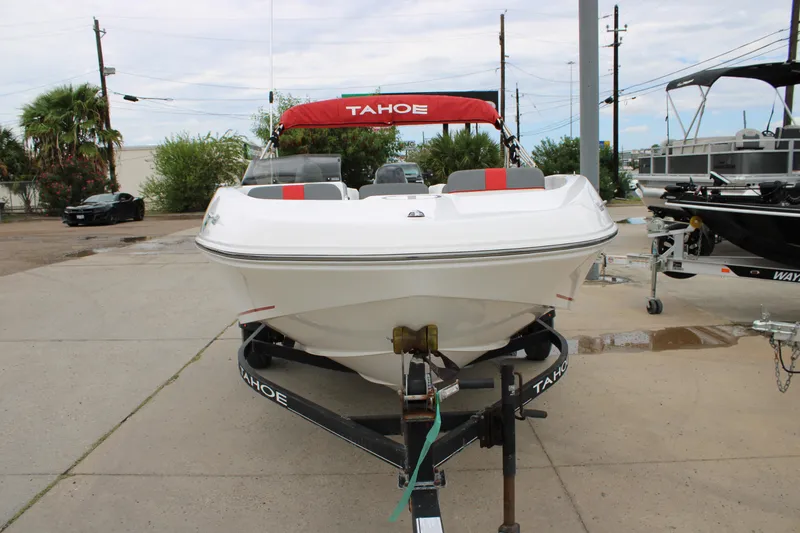 Slide: The Image of 2022 Tahoe T16 boat on trailer, outdoor display, front view. - 11