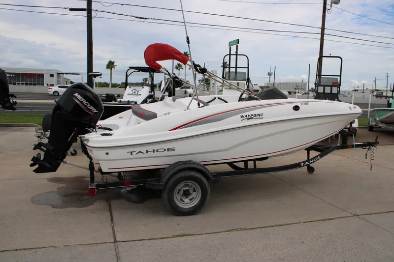 Slide: The Image of 2022 Tahoe T16 boat on trailer with Mercury outboard motor. - 3