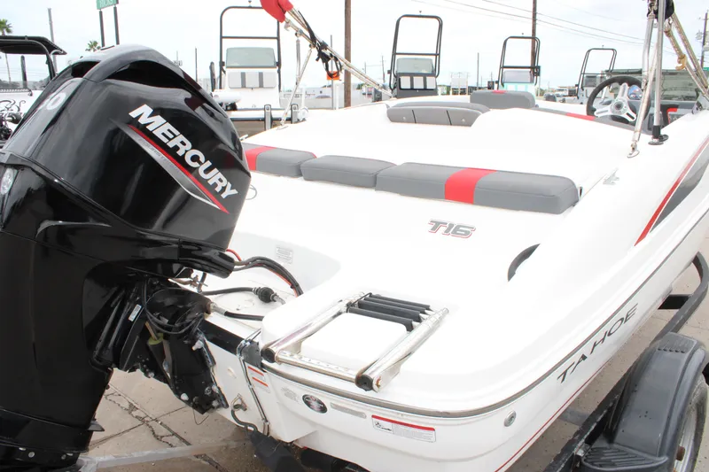 Slide: The Image of 2022 Tahoe T16 boat with Mercury engine, featuring sleek design and comfortable seating. - 4