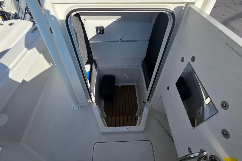 Slide: The Image of 2026 Ranger 2510 Bay boat deck with white cushioned seating. - 7