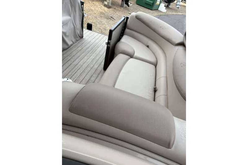 Slide: The Image of Luxurious seating on 2018 Avalon 2385 EL pontoon boat, featuring beige upholstery. - 15