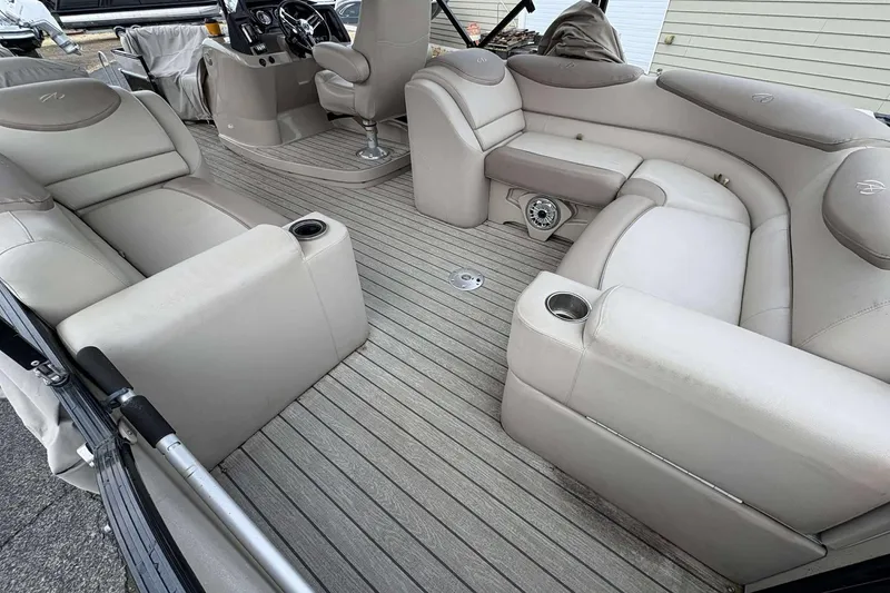 Slide: The Image of Luxurious interior of 2018 Avalon 2385 EL pontoon boat with plush seating. - 19