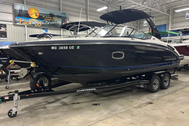 Slide: The Image of 2017 Chaparral 257 SSX boat on trailer in indoor showroom. - 1