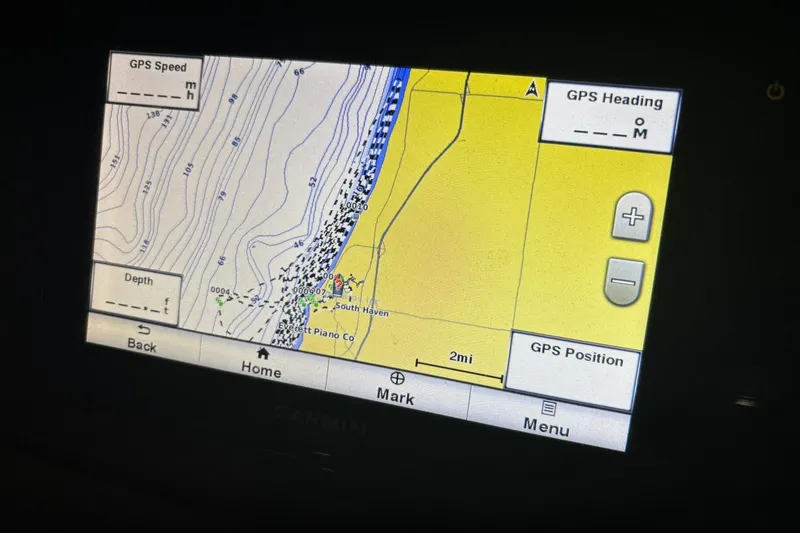 Slide: The Image of GPS navigation screen on a 2017 Chaparral 257 SSX boat, displaying map and controls. - 11