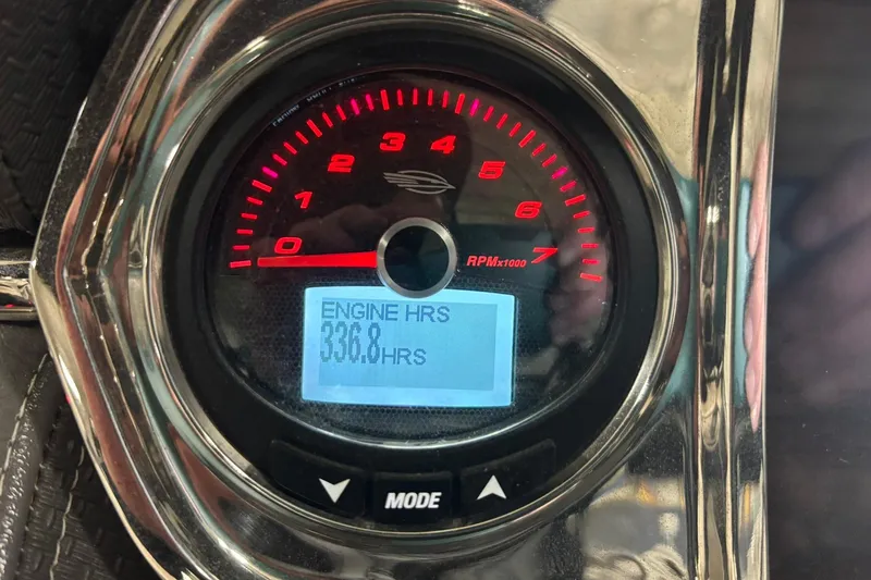 Slide: The Image of Close-up of 2017 Chaparral 257 SSX tachometer showing 336.8 engine hours. - 12