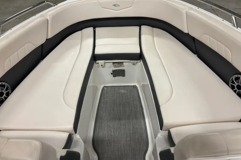 Slide: The Image of 2017 Chaparral 257 SSX boat interior with white and black seating. - 13