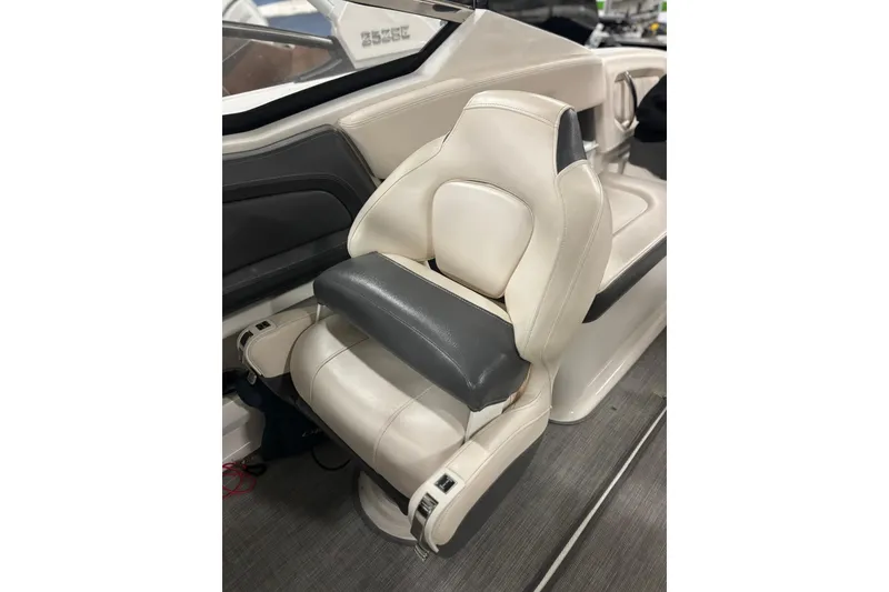 Slide: The Image of 2017 Chaparral 257 SSX boat seat, featuring luxurious white and gray upholstery. - 18