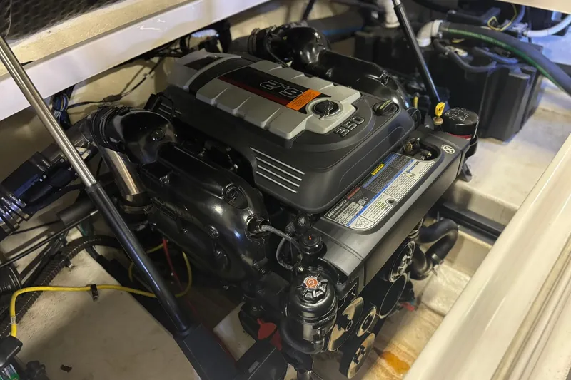 Slide: The Image of Engine compartment of 2017 Chaparral 257 SSX boat, featuring a powerful 350 engine. - 22