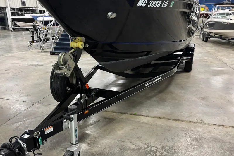 Slide: The Image of 2017 Chaparral 257 SSX boat on trailer in indoor storage facility. - 38