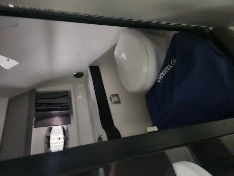 Slide: The Image of Interior bathroom of 2018 Formula 310 Sun Sport boat with toilet and window. - 20
