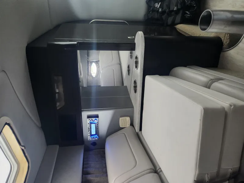 Slide: The Image of 2018 Formula 310 Sun Sport cabin interior with seating and control panel. - 27