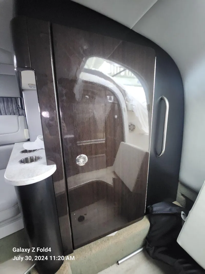 Slide: The Image of Interior of 2018 Formula 310 Sun Sport boat, featuring sleek cabinetry and modern design. - 41