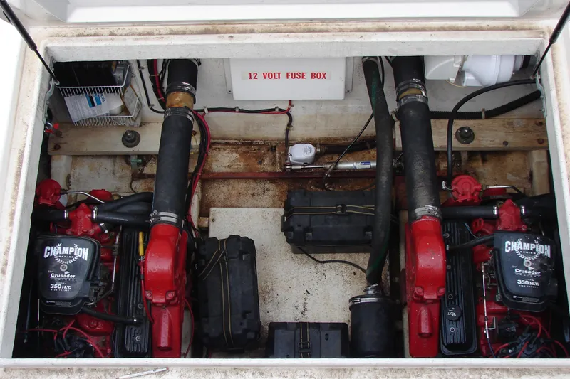 Slide: The Image of Engine compartment of a 1997 Gibson 47 Sport Houseboat with dual Champion Crusader engines. - 35