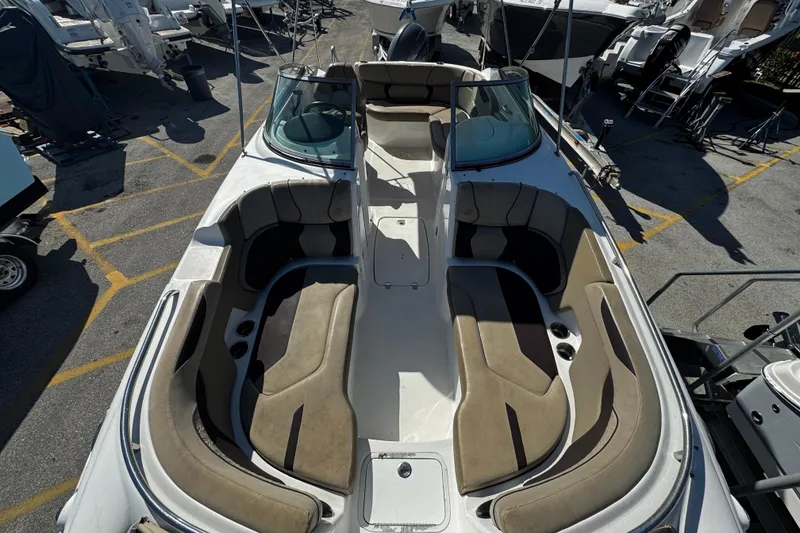 Slide: The Image of 2021 Hurricane SunDeck 2200 DC OB boat with spacious seating and sleek design. - 29