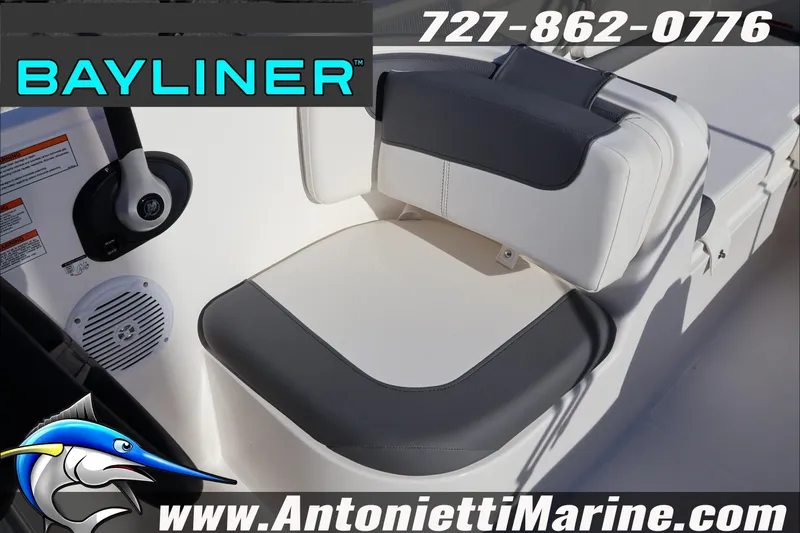 Slide: The Image of 2025 Bayliner Element E18 boat interior with seating, steering, and speaker details. - 11