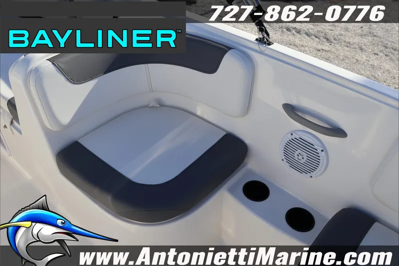 Slide: The Image of 2025 Bayliner Element E18 boat interior with seating, speaker, and cup holders. - 12