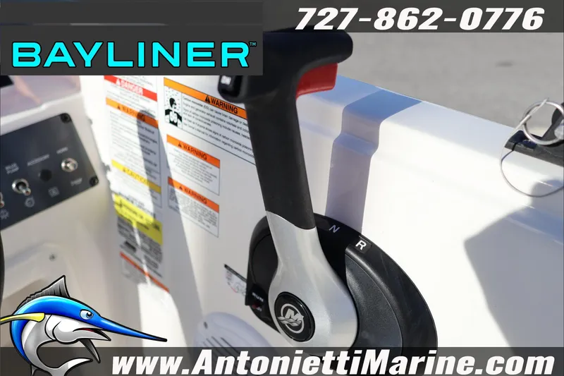 Slide: The Image of 2025 Bayliner Element E18 boat controls with branding and contact information. - 14