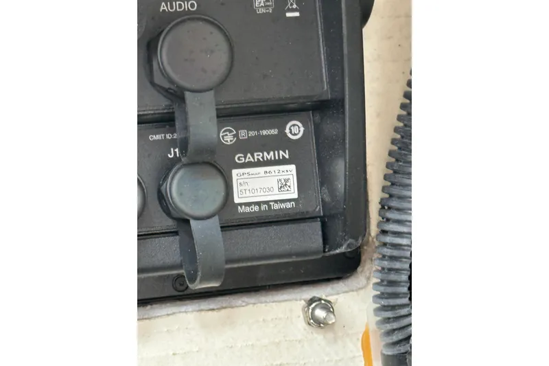 Slide: The Image of Garmin GPS device on 2021 Pathfinder 2500 Hybrid, labeled "Made in Taiwan." - 26