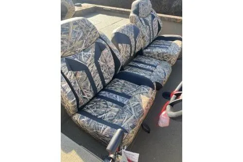 Slide: The Image of 2026 G3 Sportsman 1710 PFX boat seats with camouflage pattern and black accents. - 4