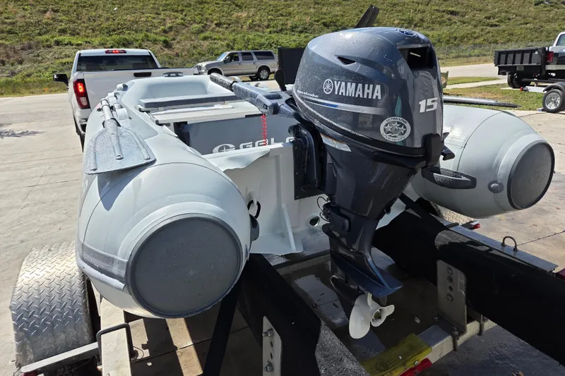 Slide: The Image of 2026 Gala A330HD inflatable boat with Yamaha 15 outboard motor on trailer. - 5