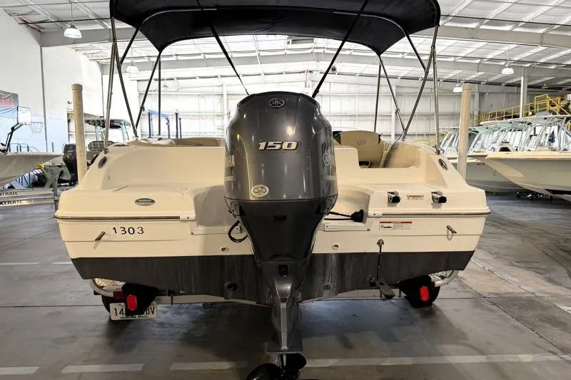 Slide: The Image of 2019 Hurricane SunDeck Sport 188 OB boat with Yamaha 150 engine in a warehouse. - 10