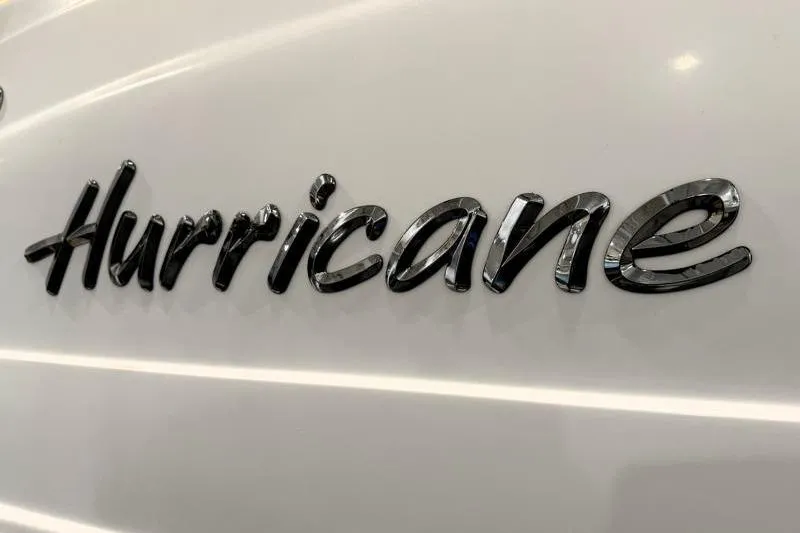Slide: The Image of 2019 Hurricane SunDeck Sport 188 OB logo on white surface. - 15