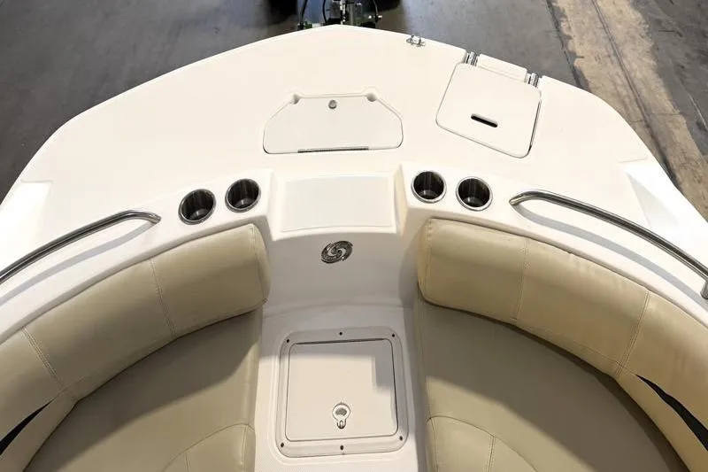 Slide: The Image of 2019 Hurricane SunDeck Sport 188 OB boat interior with seating and cup holders. - 17