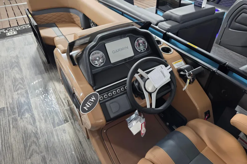 Slide: The Image of Interior of 2026 Godfrey Monaco 255 MTF boat with Garmin dashboard display. - 10