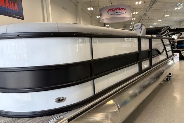 Slide: The Image of 2026 Bentley Pontoons Legacy 223 Swingback in showroom, sleek design with modern features. - 15