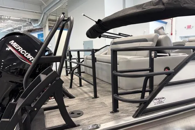 Slide: The Image of 2026 Bentley Pontoons Legacy 223 Swingback with Mercury engine, showcasing sleek design and comfortable seating. - 18