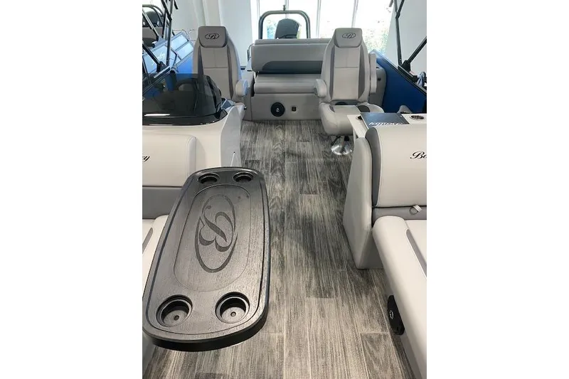 Slide: The Image of 2026 Bentley Pontoons Legacy 223 Swingback interior with elegant seating and stylish flooring. - 8