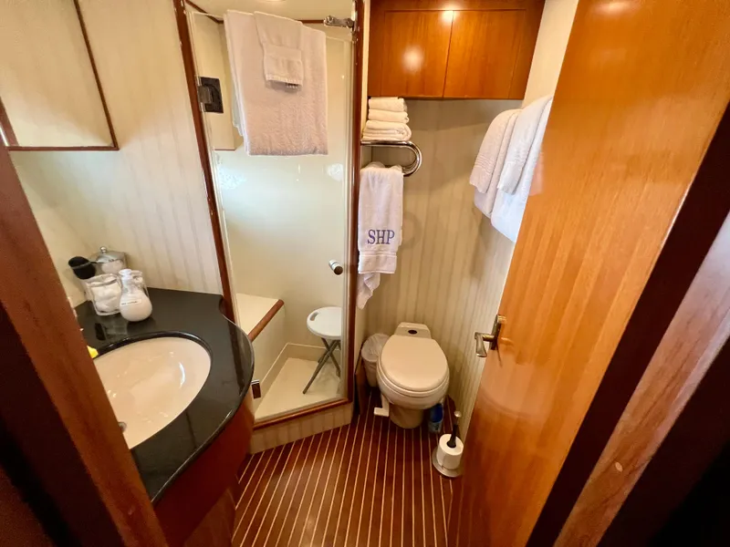 Slide: The Image of Luxurious bathroom in 2004 Ocean Alexander Atlus 48 yacht with modern amenities. - 24