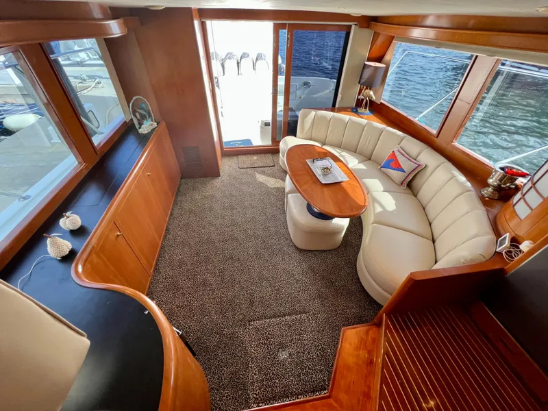 Slide: The Image of Luxurious interior of 2004 Ocean Alexander Atlus 48 yacht with elegant seating and wood finishes. - 1