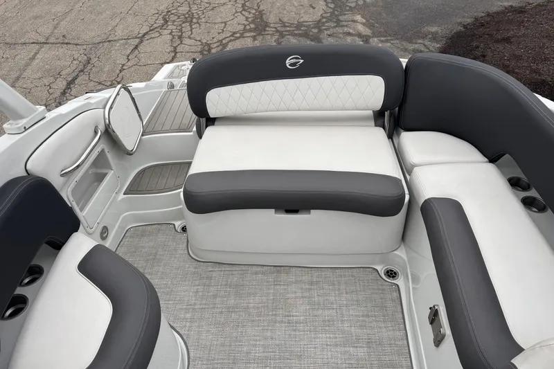 Slide: The Image of 2022 Crownline 255 SS boat interior with stylish seating and modern design. - 18